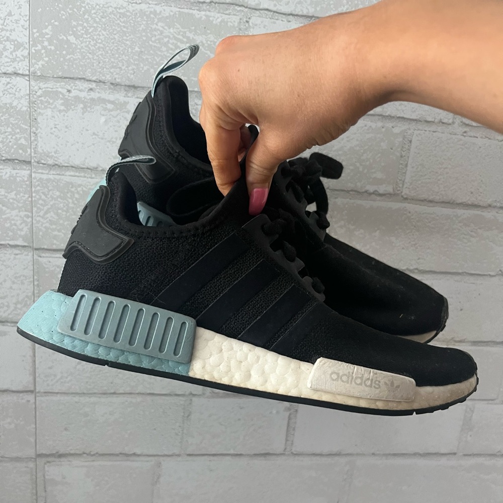 Adidas NMD’s black shoes w/ blue and white soles